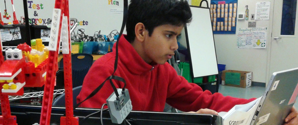 robotics student with laptop